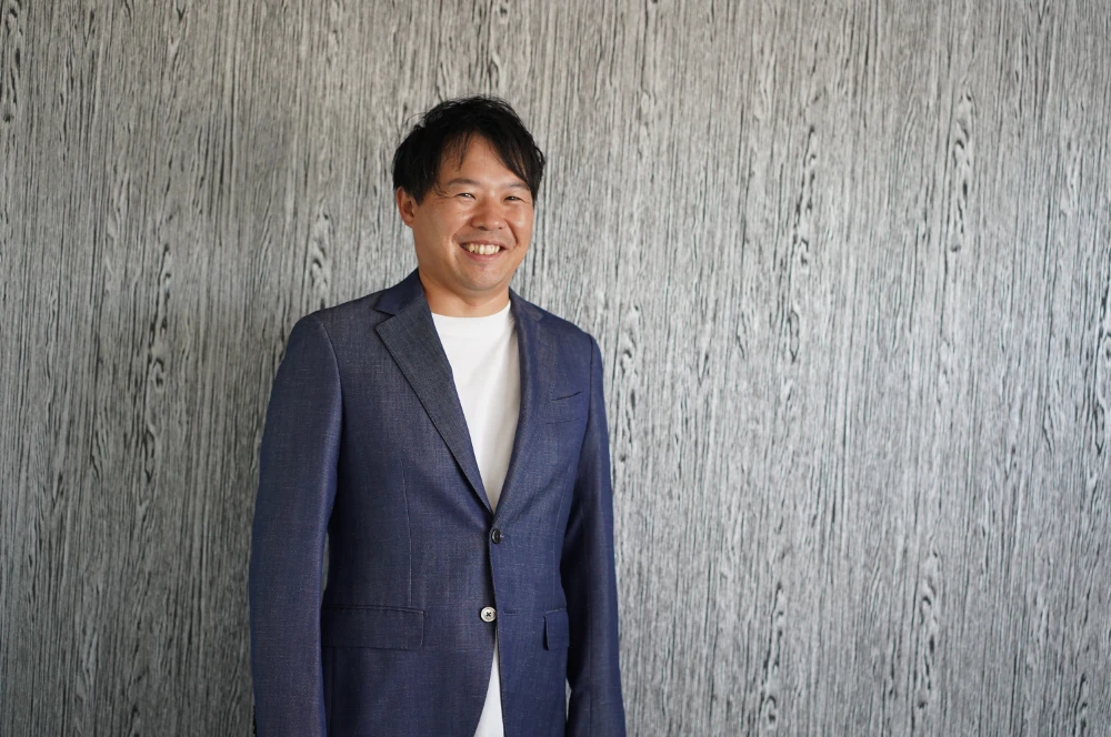 専務丸山の顔写真